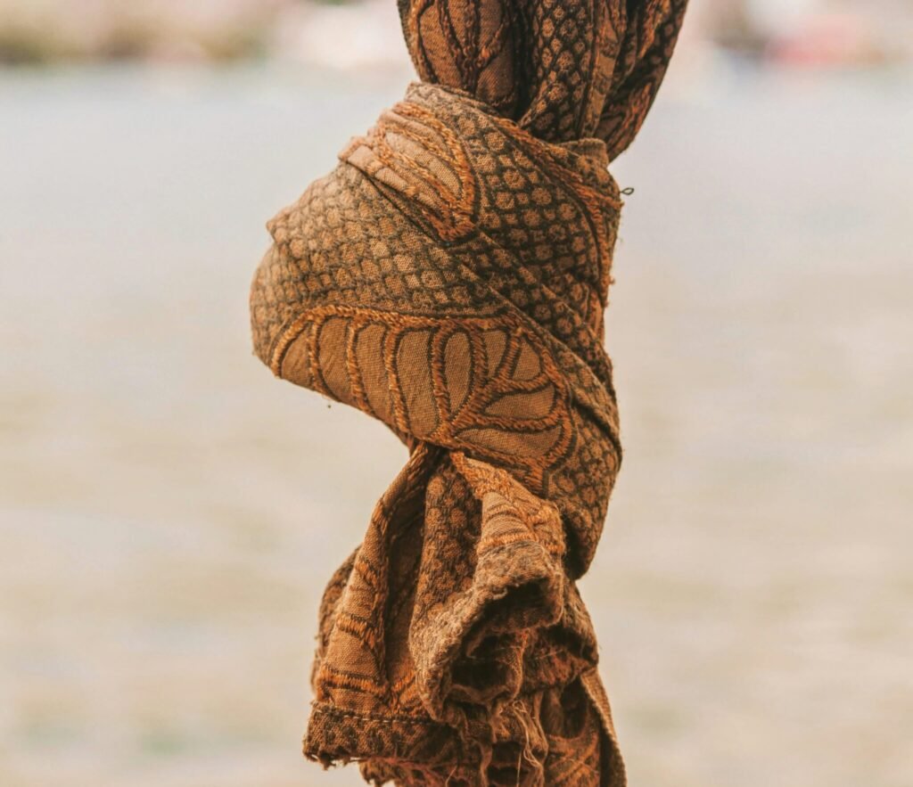 a close up of a cloth hanging from a pole
