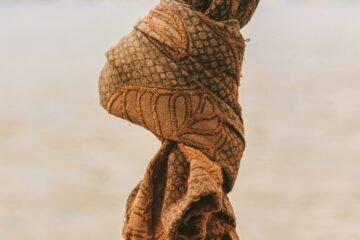 a close up of a cloth hanging from a pole