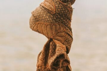 a close up of a cloth hanging from a pole