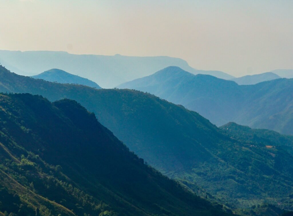 a view of a mountain range from a distance